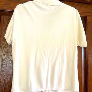 Cream colored camisole. Good condition. No spots. None smoking environment.